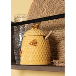 Honingpot met houten lepel geel