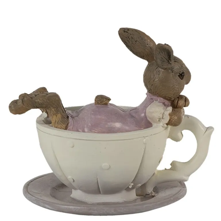 Konijnen meisje liggend in kop en schotel