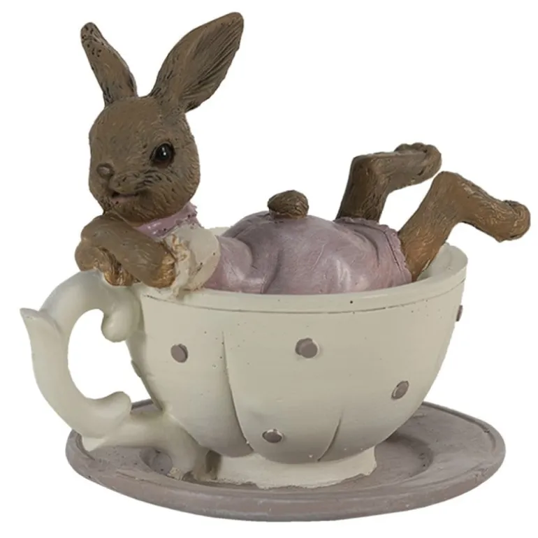 Konijnen meisje liggend in kop en schotel