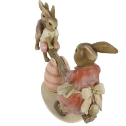 Moeder Bunny op de wip met de kleintjes