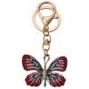 Sleutel / Tashanger vlinder rood/roze/blauw